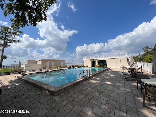 view of pool featuring a patio area