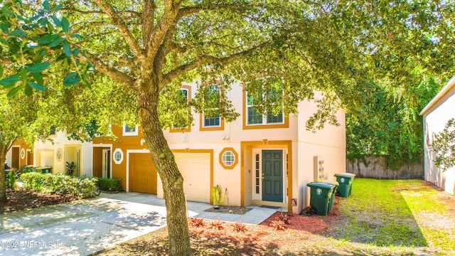 view of front of property featuring a garage