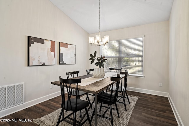 dining room featuring high vaulted ceiling, a chandelier, and dark hardwood / wood-style floors