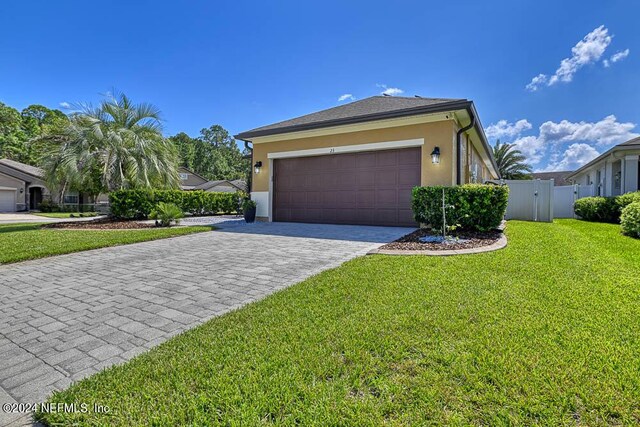 exterior space with a lawn