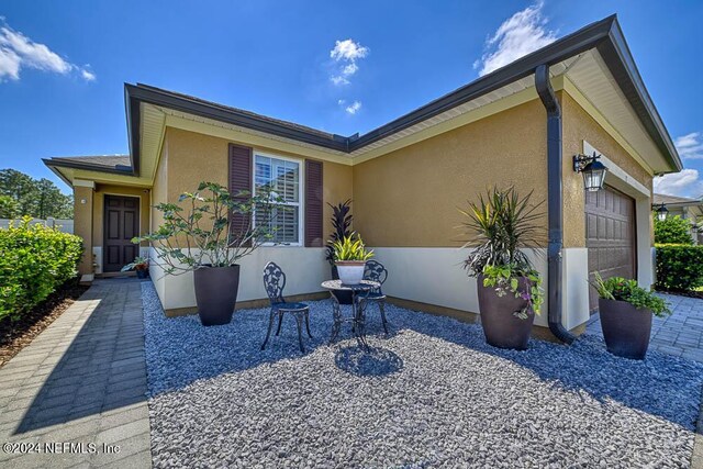 view of property exterior with a garage