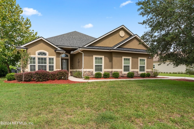 view of front of house with a front lawn