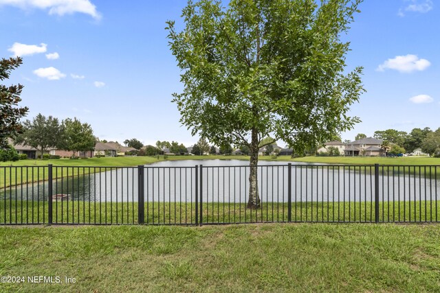 view of yard with a water view