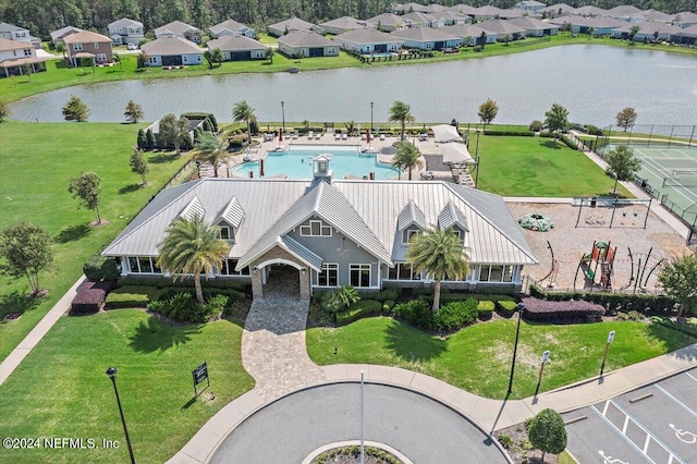 birds eye view of property featuring a water view