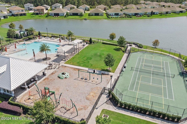 birds eye view of property featuring a water view