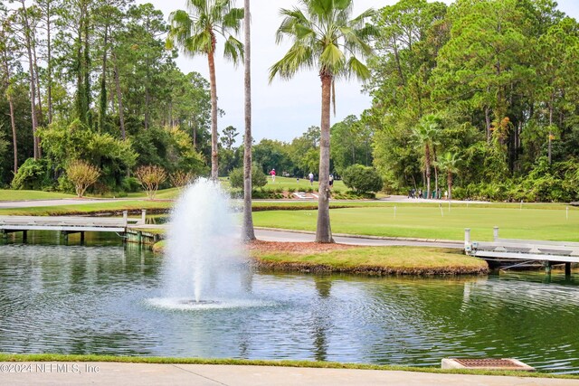 view of home's community featuring a water view