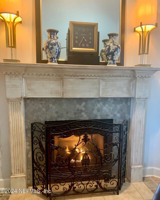 interior details featuring a fireplace