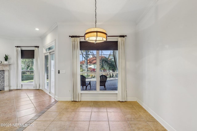 doorway to outside with light tile patterned floors and crown molding