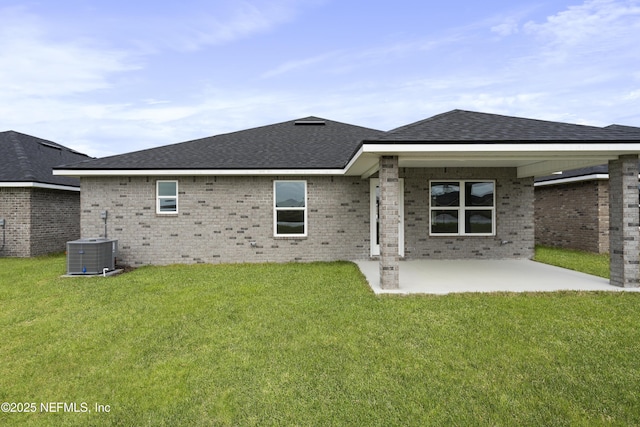 3145 Forest View Ln, Green Cove Springs, FL 32043 - back of property with a patio area, a lawn, and brick siding