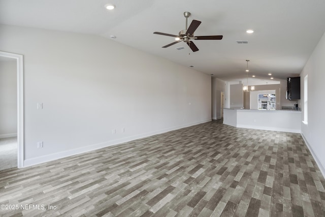 3145 Forest View Ln, Green Cove Springs, FL 32043 - unfurnished living room with lofted ceiling, wood finished floors, a ceiling fan, and recessed lighting