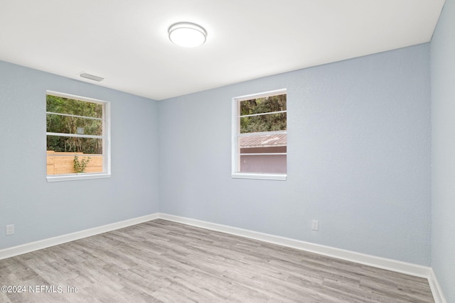 empty room with light wood-type flooring