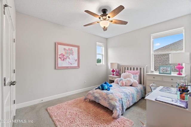 carpeted bedroom with ceiling fan