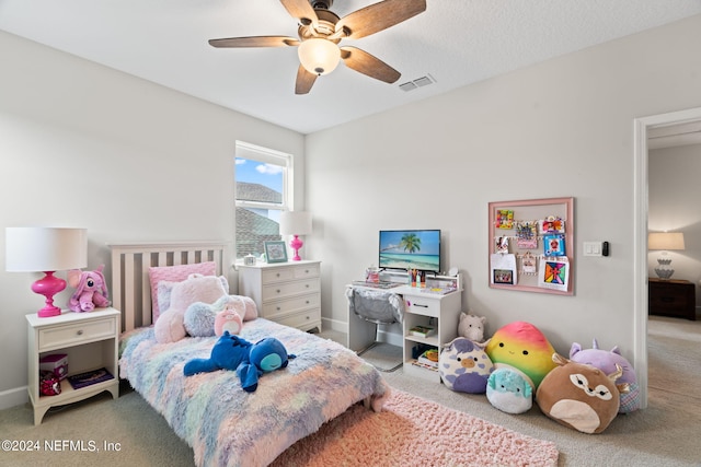 carpeted bedroom with ceiling fan