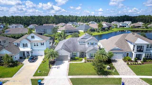 drone / aerial view featuring a water view