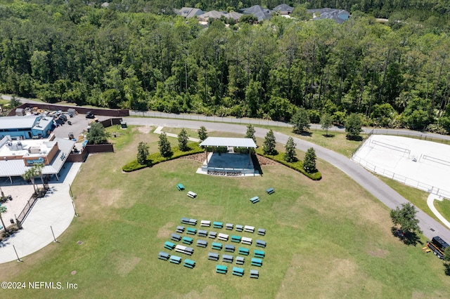 drone / aerial view with a view of trees