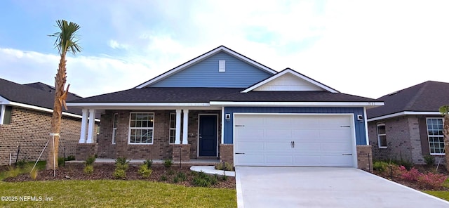 view of front of home featuring driveway, an attached garage, brick siding, a shingled roof, and a porch