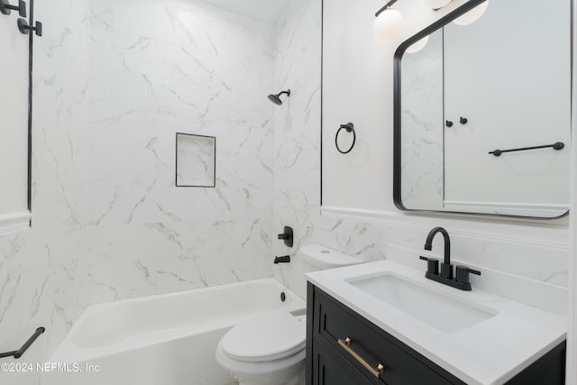 full bathroom with tiled shower / bath combo, toilet, tile walls, and vanity