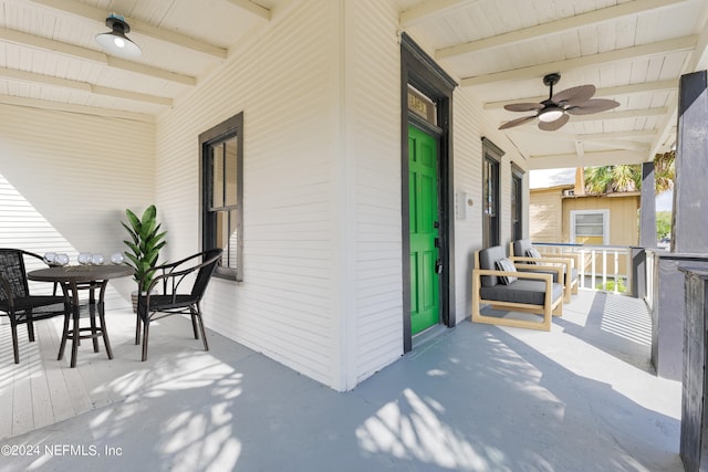 view of patio / terrace featuring ceiling fan and a porch