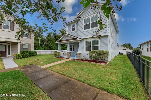 view of front of home with a front yard