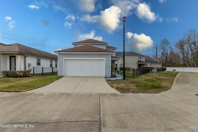 view of front of home featuring a front lawn and a fenced front yard