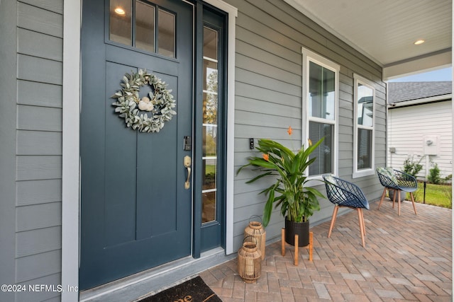 property entrance with a porch