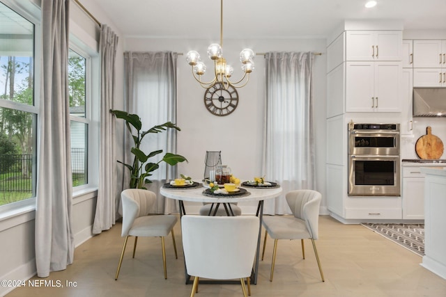 dining room featuring a chandelier