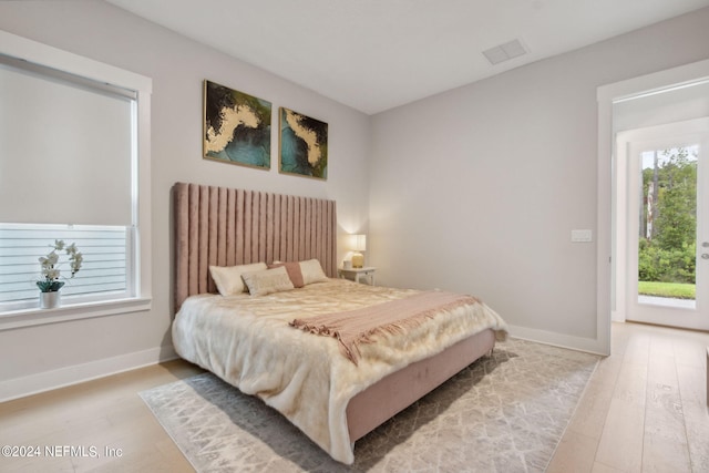 bedroom featuring light wood-type flooring