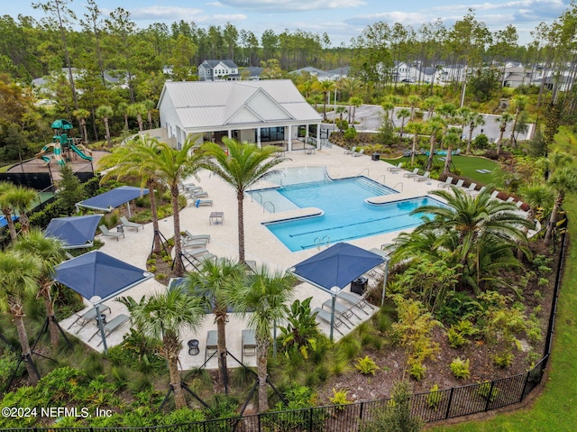 view of swimming pool featuring a patio area