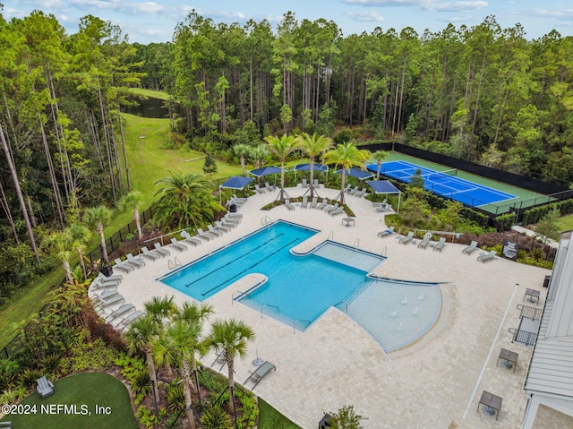 view of pool featuring a patio