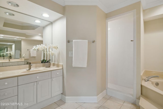 bathroom with tile patterned floors, vanity, and crown molding