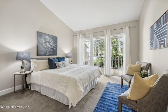 bedroom featuring carpet flooring, lofted ceiling, and access to exterior