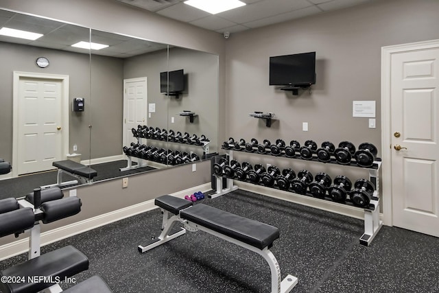 gym featuring a drop ceiling