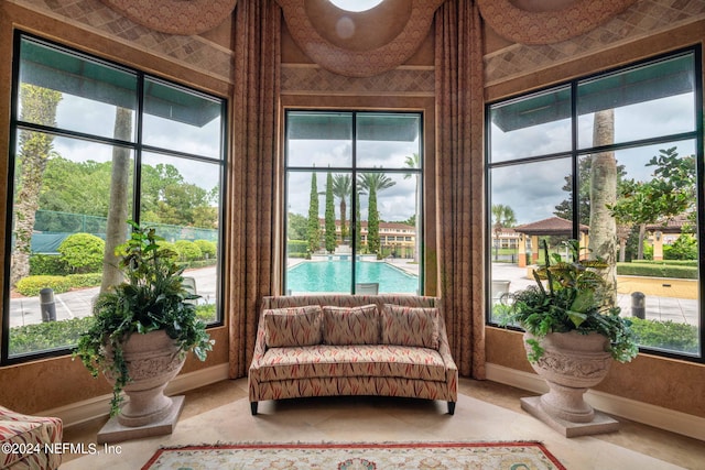 sunroom / solarium featuring a wealth of natural light