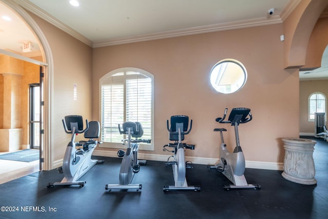 workout room with crown molding