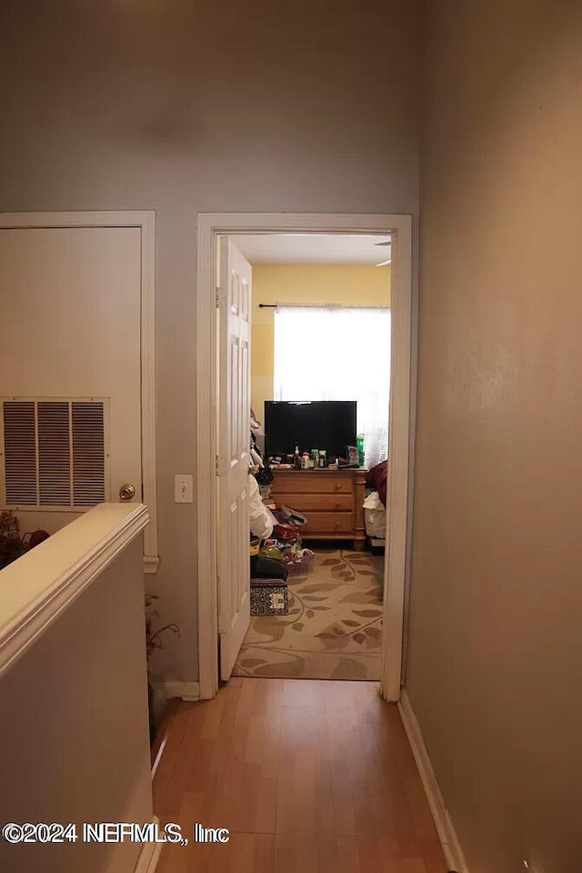 hall featuring light hardwood / wood-style floors