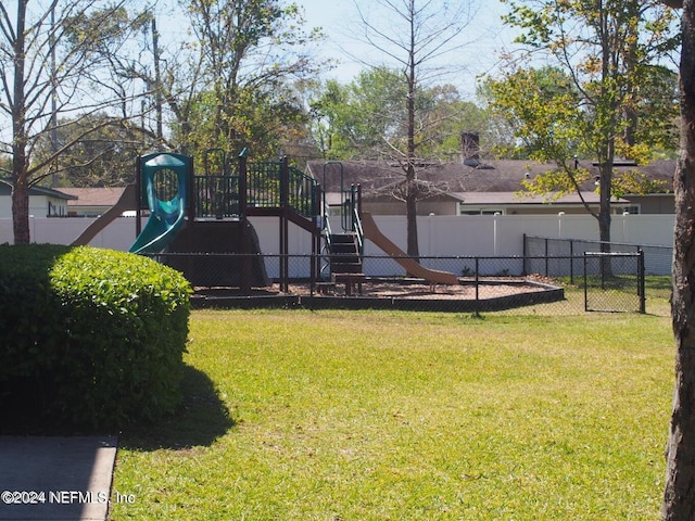 view of yard with a playground