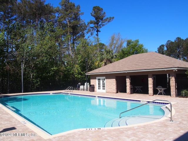 view of pool with a patio