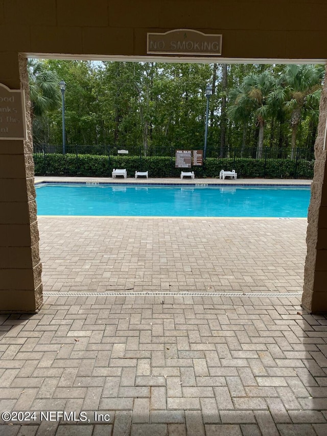 view of pool with a patio