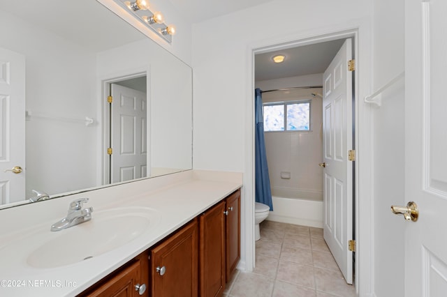 full bathroom with tile patterned floors, vanity, shower / tub combo, and toilet