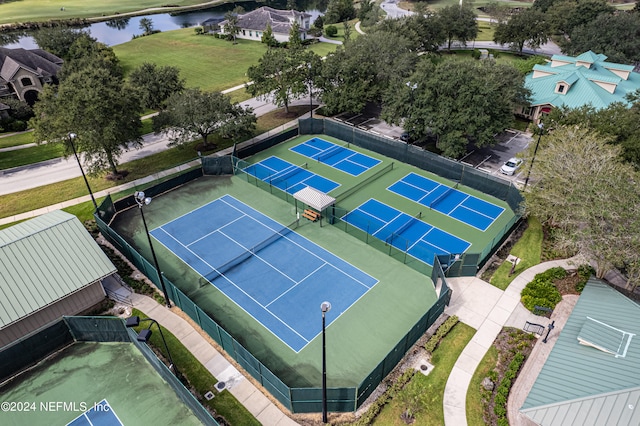 birds eye view of property featuring a water view