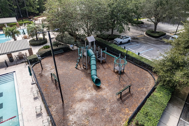 view of play area with a community pool