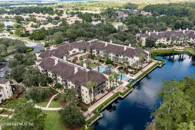 drone / aerial view featuring a water view