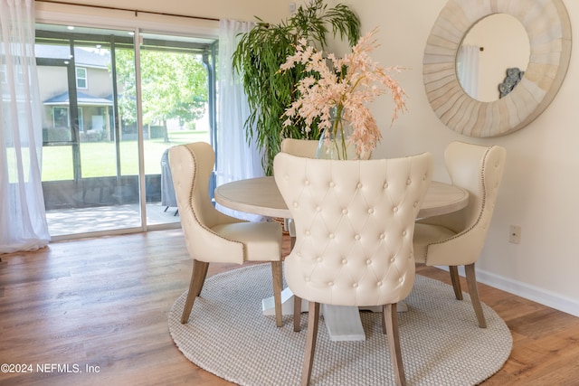 dining area with light wood-type flooring