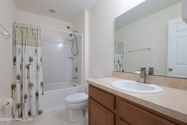 full bathroom featuring shower / tub combo with curtain, vanity, toilet, and tile patterned flooring