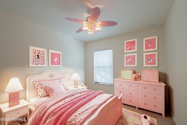 bedroom featuring light hardwood / wood-style flooring and ceiling fan