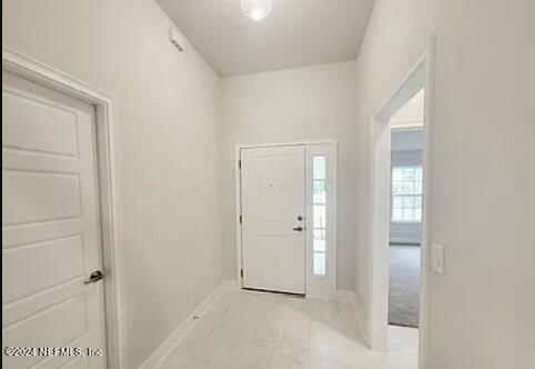 entrance foyer featuring a healthy amount of sunlight