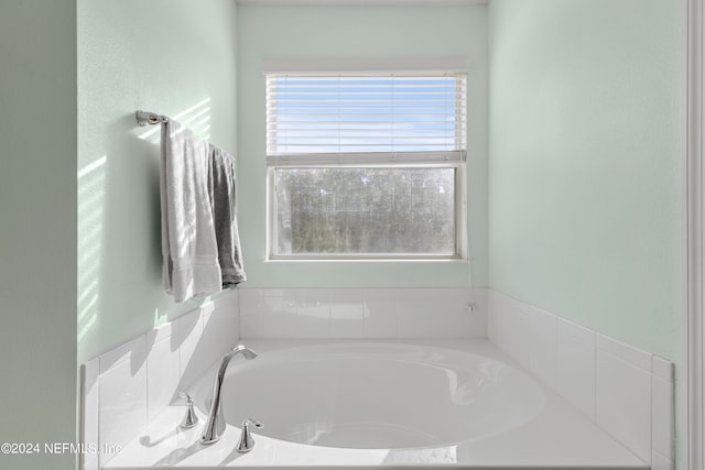 bathroom featuring a tub