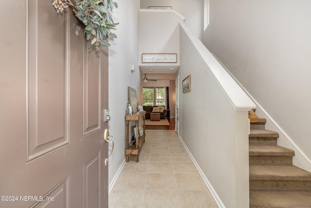 entryway featuring light tile patterned flooring