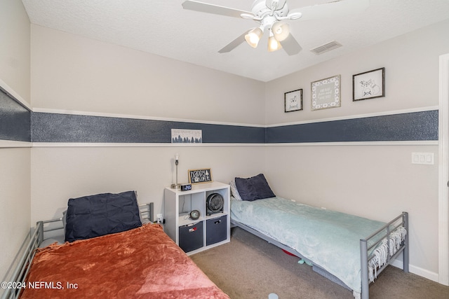 bedroom with ceiling fan and carpet