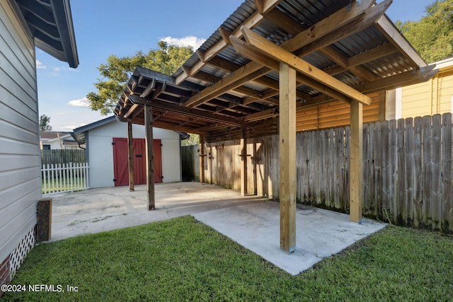 view of patio / terrace with a storage unit